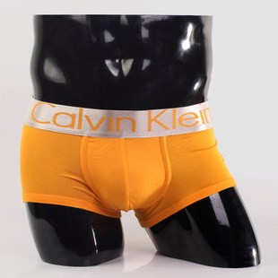 Мужские трусы Calvin Klein оранжевые с серебряной резинкой Steel A009 Мужские трусы Calvin Klein оранжевые с серебряной резинкой Steel A009