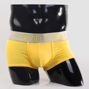 Мужские трусы Calvin Klein желтые с серебряной резинкой Steel A010 Мужские трусы Calvin Klein желтые с серебряной резинкой Steel A010