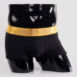 Мужские трусы Calvin Klein черные с золотой резинкой Steel A021 Мужские трусы Calvin Klein черные с золотой резинкой Steel A021